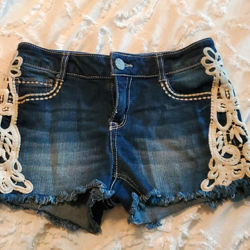 Dark wash short shorts.